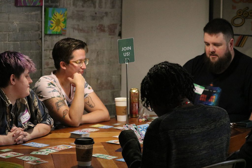Prism Tabletop Club LGBTQ+ Game Night Full Table of Gamers